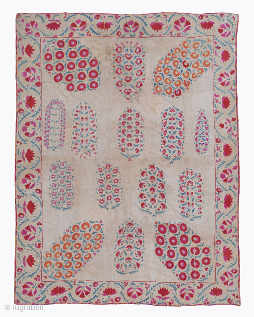 Period: Early 19th Century
Origin: Central Asia
Dimensions: 155 x 215 cm

This rare early 19th century Nurata Suzani highlights a powerful and rhythmic floral composition featuring a delicate central star medallion surrounded by a  ...