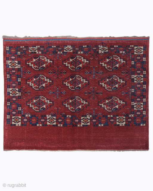 Period: Mid 19th Century
Origin: Turkmenistan
Dimensions: 90 x 118 cm

This rare mid 19th century Yomud chuval highlights a powerful and rhythmic geometric composition featuring a classic 3×3 grid of large-scale “chuval-gul” motifs anchored  ...