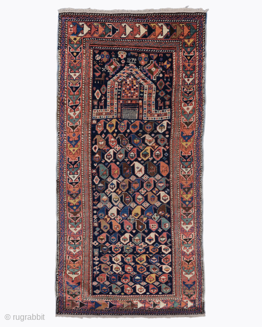 Period: Mid 19th Century
Origin: Caucasus
Dimensions: 80 x 155 cm

This rare mid 19th century Akstafa prayer rug highlights a powerful and rhythmic geometric composition featuring a monumental architectural mihrab anchored within a deep  ...