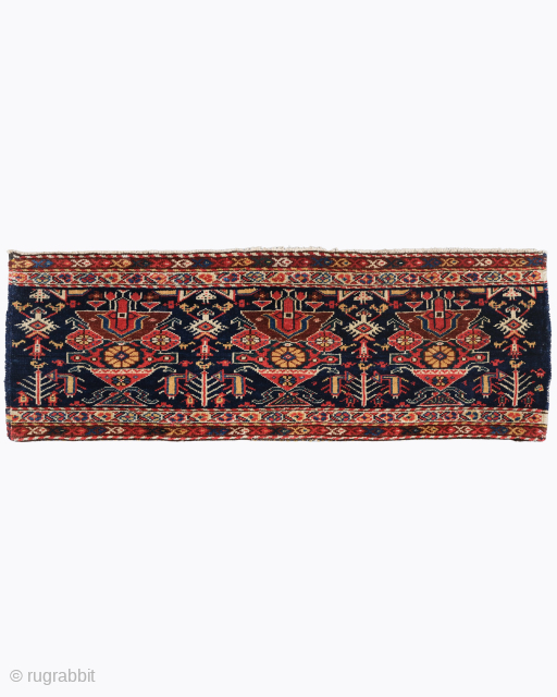 Period: Late 19th Century
Origin: Iran
Dimensions: 44 x 120 cm

This rare late 19th century Antique Persian Bagface highlights a powerful and rhythmic geometric composition featuring a sequence of stylized tribal medallions anchored within  ...