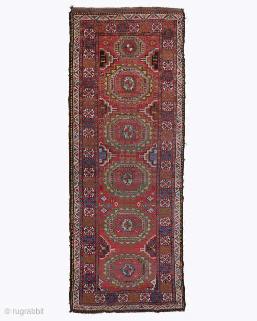 Period: Early 20th Century
Origin: Iran
Dimensions: 110 x 310 cm
This rare, early 20th-century Kurdish runner is a magnificent and powerfully expressive testament to the nomadic and village weaving traditions of the Kurdish tribes, ...
