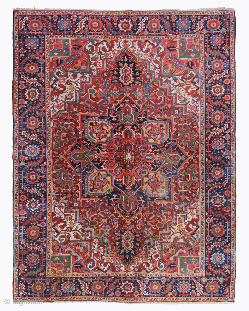 Period: Late 19th Century
Origin: Iran
Dimensions: 265 x 355 cm
This rare, early 19th century Heriz carpet is a magnificent and powerfully expressive example of Northwest Persian village weaving, celebrated for its robust structural ...