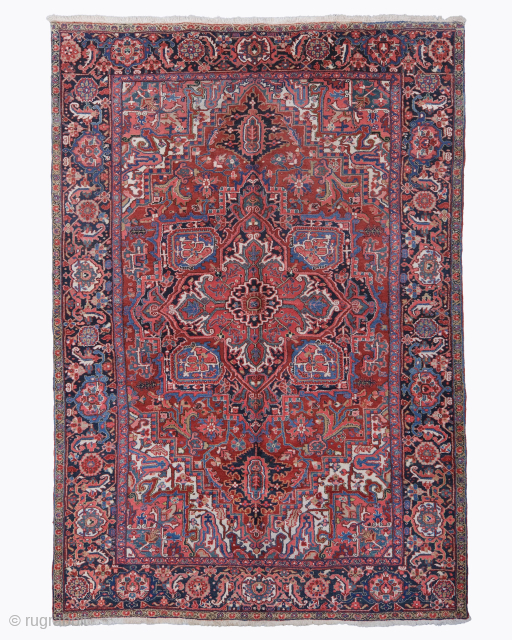 Period: Late 19th Century
Origin: Iran
Dimensions: 233 x 345 cm
This rare, late 19th century Heriz carpet is a magnificent and powerfully expressive example of Northwest Persian village weaving, celebrated for its robust structural ...