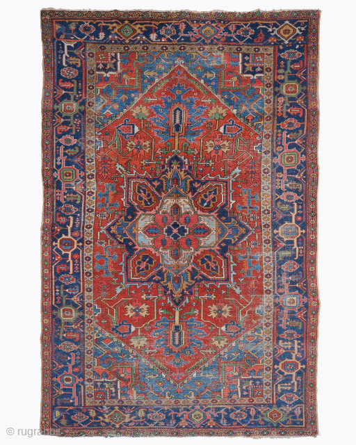 Period: Late 19th Century
Origin: Iran
Dimensions: 242 x 350 cm

This rare late 19th century Heriz carpet is a magnificent and powerfully expressive example of Northwest Persian village weaving, celebrated for its robust structural  ...