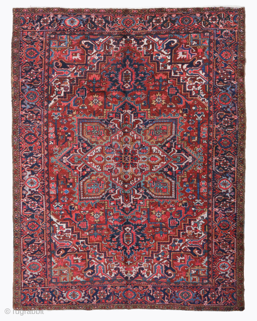 Period: Late 19th Century
Origin: Iran
Dimensions: 223 x 303 cm

This rare late 19th century Heriz carpet is a magnificent and powerfully expressive example of Northwest Persian village weaving, celebrated for its robust structural  ...