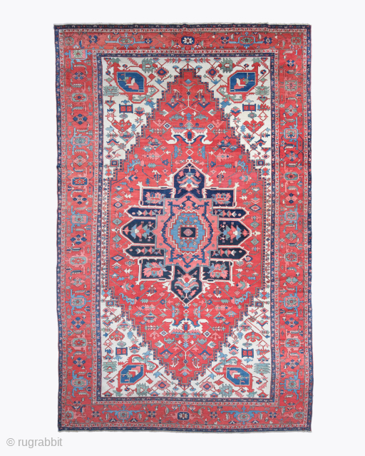Period: Late 19th Century
Origin: Iran
Dimensions: 320 x 560 cm

This rare late 19th century Persian Serapi carpet highlights a powerful and architectural composition featuring a monumental, multi tiered hexagonal medallion rendered in deep  ...