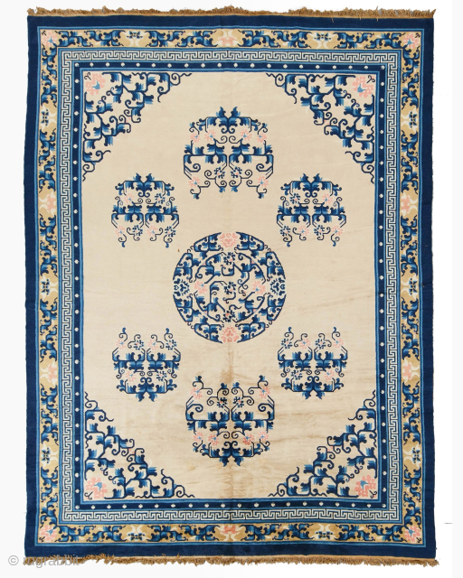Period: 19th Century
Origin: China
Dimensions: 280 x 370 cm
This rare 19th century antique Chinese Peking carpet highlights a powerful and rhythmic floral composition featuring a central lobed medallion and eight surrounding floral sprays ...