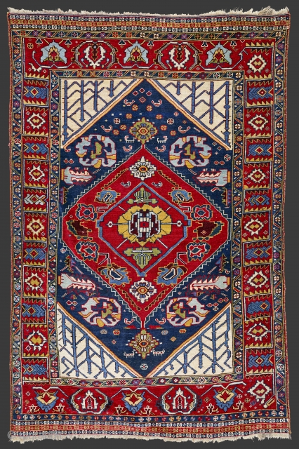Late 19th century,South West Persia, Fars Khamseh Rug
In this Khamseh, probably a weaving of the Baharlu/Ainalu tribal group, the large scale of the designs, the massive impact of the composition and the  ...