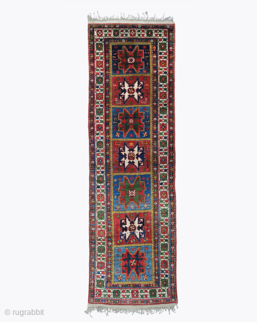 This elegant Lezgi long rug was handwoven by the Lezgi people in the northeastern Caucasus around the 1870s. It beautifully reflects the characteristic style of the period, with its rich color palette,  ...