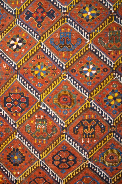 Middle of 19th Century,Central Asia, central Amu Darya valley Beshir ıkat design rug.An antique Beshir showing a diamond design; flowers, palmettes and botehs alternate in the various compartments. –The original kilim finishes  ...