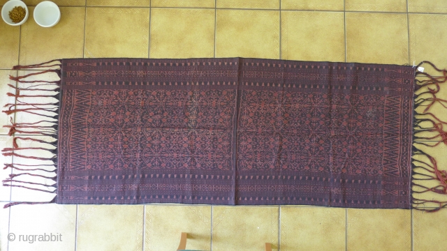 Lio Flores Ikat, I bought this is Maumere in 1974.Natural dye. 68" (w/o fringe) x 27". Very fine homespun yarn. Weight of cloth, 328gm. It is one of about ten Indonesian ikat  ...