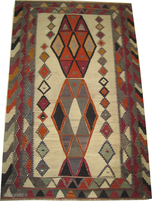 
Qashqai Kelim Persian, semi-antique, 139 x 216 cm, ID: 2320>br>
Flat woven with hand spun wool, the background is ivory, at the center two medallions, in perfect condition.


      