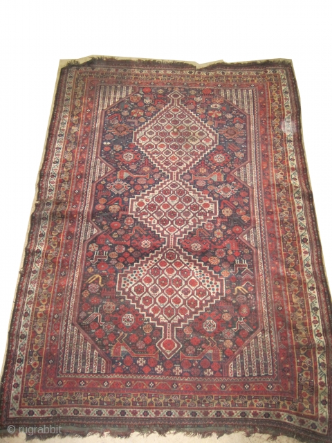 	

Shiraz Khamse Persian circa 1900 antique, collector's item, Size: 253 x 176 (cm) 8' 4" x 5' 9"  carpet ID: UD-2
Vegetable dyes, the black color is oxidized, the knots are hand  ...