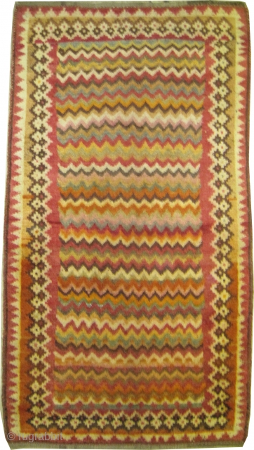 
	

Gabbeh Nomad Persian knotted circa in 1940 semi antique.  196 x 106 (cm) 6' 5" x 3' 6"  Carpet ID: K-5707
The knots are hand spun wool, the warp and the  ...
