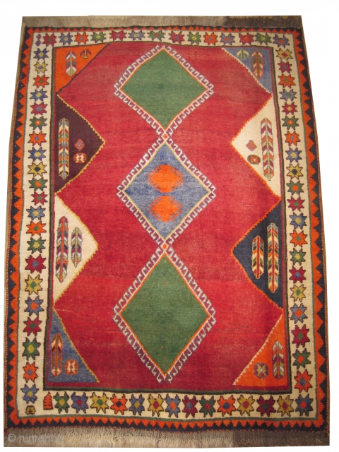 	

Gabbeh Nomad Persian knotted circa in 1935 semi antique, collector's item, 178 x 134 (cm) 5' 10" x 4' 5"  carpet ID: M-390
The background color is red, both edges are finished  ...