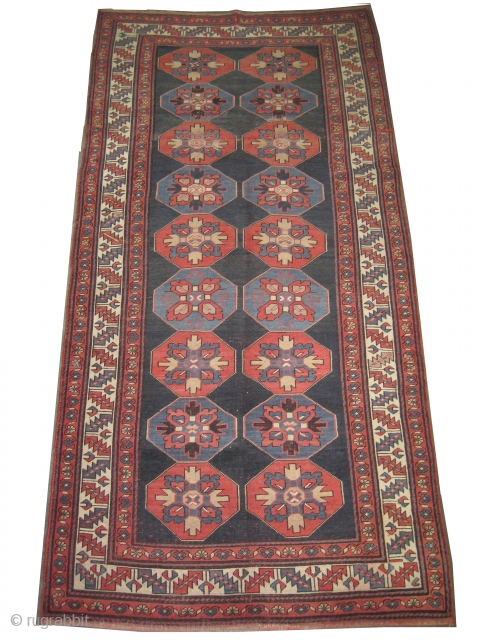 
Lambalo Kazak Caucasian circa 1910 antique. Collector's item, Size: 260 x 126 (cm) 8' 6" x 4' 2"  carpet ID: K-5083
The background color is indigo, geometric design, the pile is slightly  ...