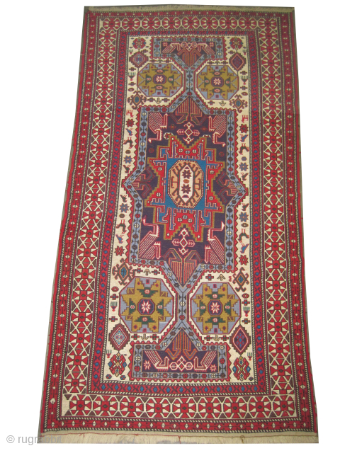 Ardabil Persian, woven circa 1940 with Soumak technique, 99 x 199 cm, ID: SA-1166
The weft threads are wool, the ivory background and the surrounded large ivory border are 100% silk, the center  ...