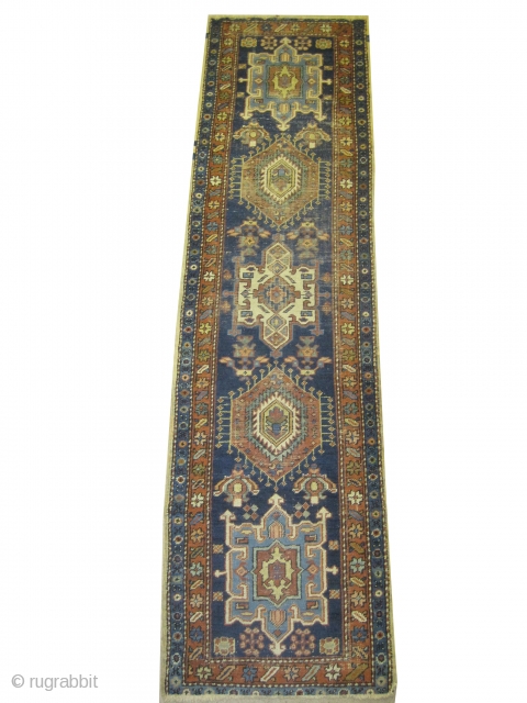 
Karadja Persian circa 1920 semi antique. Size: 247 x 69 (cm) 8' 1" x 2' 3"  carpet ID: K-4188
Good condition, the background color is indigo, five medallions, in its original shape.  ...