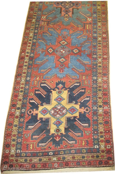 	

Heriz Persian circa 1920, Size: 430 x 109 (cm) 14' 1" x 3' 7"  carpet ID: K-4437
The background color is rust with five center medallions tchelaberd design, each medallion in different  ...