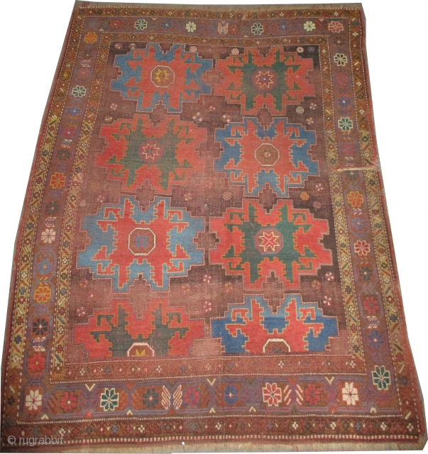 
	

Star Kazak Caucasian, knotted circa in 1870 antique, collector's item, 180 x 147 (cm) 5' 11" x 4' 10"  carpet ID: K-4036
Part of the oxidized brown knots is worn. The knots,  ...