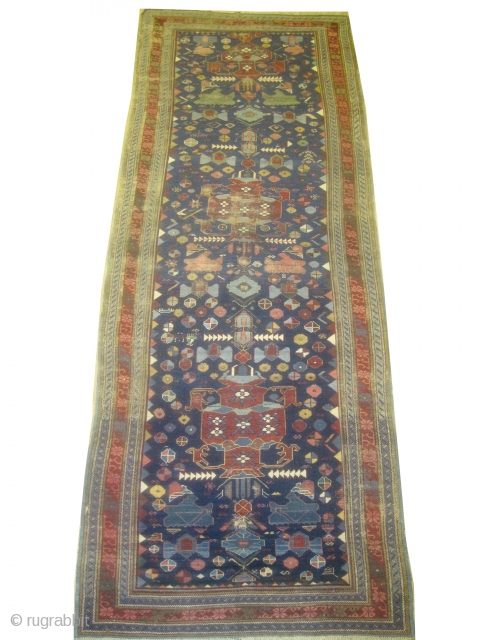 Sejshour Kouba Caucasian antique, 330 x 123 (cm) 10' 10" x 4' carpet ID: K-3461
The knots, the warp and the weft threads are hand spun wool, the black color is oxidized, certain  ...