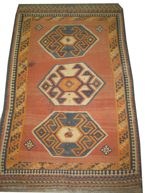 

Qashqai Kelim Persian, woven circa 1930, 145 x 224 cm, ID: SA-1608
Vegetable dyes, the orange is synthetic, woven with hand spun 100% wool, the background color is rust, the center three medallions  ...