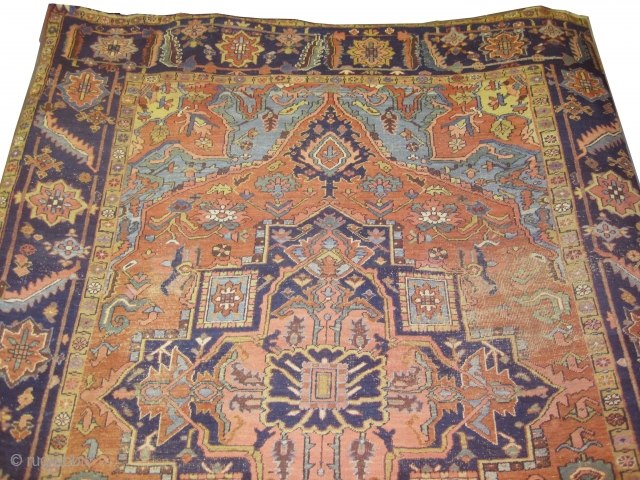  	

Serapi Heriz Persian circa 1905 antique. Size: 430 x 293 (cm) 14' 1" x 9' 7"  carpet ID: P-4059
The black color is oxidized, pink with navy blue center medallion, rust  ...