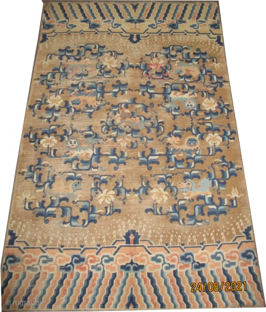 

Ningxia Chinese lion-dogs rug, knotted circa 1880 antique, collectors item, 244 x 154 cm, ID: K-4673
The knots are hand spun wool, the background color is gold, the pile of oxidized places is  ...