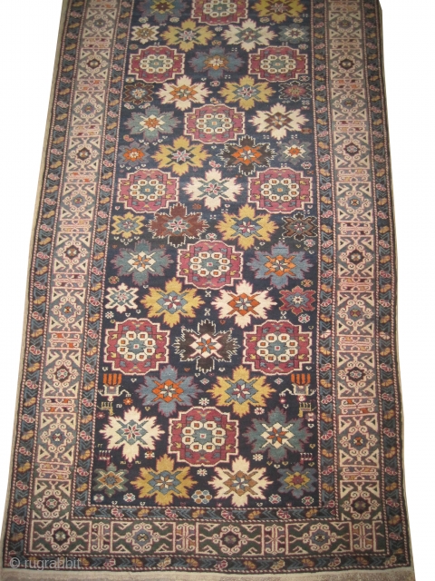 Kouba Caucasian knotted circa in 1910 antique. Collector's item, Size: 350 x 128 (cm) 11' 6" x 4' 2"  carpet ID: H-125
In perfect condition, thick pile, the surrounded large olive green  ...