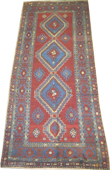 
Fachralo-Kazak Caucasian knotted circa in 1915 antique. Size: 364 x 150 (cm) 11' 11" x 4' 11"  carpet ID: K-3827
The background color is warm rust with four medallions, the surrounded large  ...