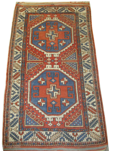 Bergama Turkish, knotted circa 1895 antique, 79 x 146 cm
Signed, thick pile, the knots are hand spun wool, vegetable dyes, the black knots are oxidized, ivory border, rust background.    