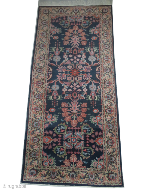 Our new website: www.madayancarpets.ch   
Indian runner, semi-antique, 87 x 190 cm, ID: LUB-16
The knots are wool, in good condition, indigo background, floral design with medallions, the surrounded large border is  ...