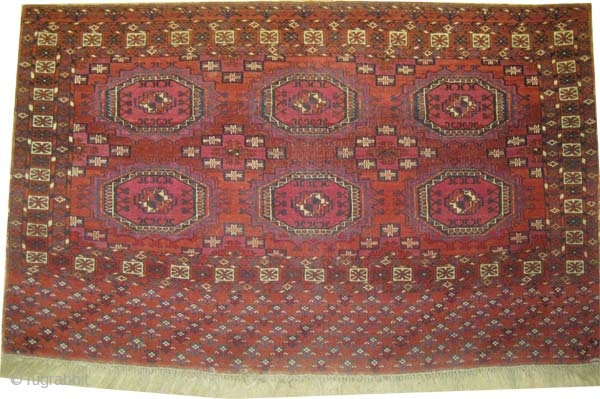 Tekke Tchwal Turkmen antique, 1870. Collectors item. CarpetID: K-5612. Size: 128 x 79 (cm) 4' 2" x 2' 7" feet.
Vegetable dyes, the black color is oxidized, the knots are hand spun wool,  ...