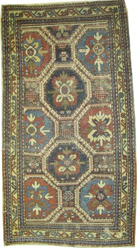 

Lambalo-Kazak Caucasian, knotted circa 1880 antique, collectors item, 96 x 180 cm, ID: K-5541
Vegetable dyes, the black knots are oxidized and worn. The knots, the warp and weft the threads are hand  ...