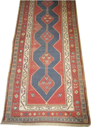 

Louristan Persian, circa 1905, antique. Collector's item, Size: 456 x 107 (cm) 14' 11" x 3' 6"  carpet ID: K-2394 
vegetable dyes, the black color is oxidized, the knots are hand  ...