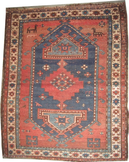  Fachralo-Kazak Caucasian, twice dated 1333 = 1914, antique. Size: 128 x 104 (cm) 4' 2" x 3' 5"  carpet ID: K-5080 
The black color is oxidized, the warp and the  ...