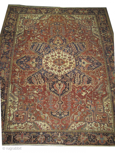

Serapi-Herriz Persian knotted circa 1918 antique, 314 x 256 cm,  ID: P-5400
The black knots are oxidized, the knots are hand spun wool, the background color is brick, the center medallion is  ...