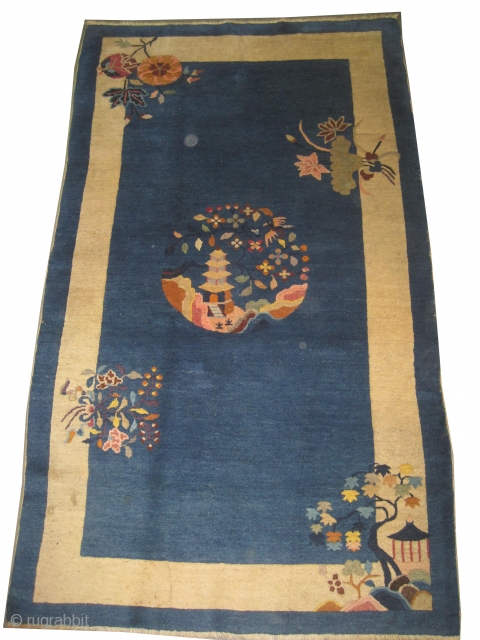 Chinese circa 1930.  Size: 119 x 205 (cm) 3' 11" x 6' 9" 
 carept ID: K-2717 
certain colors are oxidized, the knots are hand spun wool, indigo background, high pile,  ...