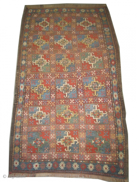 
 	

Gutschan-Kurd Persian knotted circa in 1905 antique. Collector's item, Size: 229 x 123 (cm) 7' 6" x 4'  carpet ID: E-242
High pile, all over geometric chess design, the surrounded large  ...