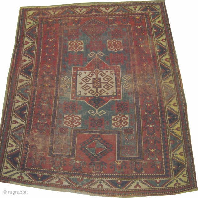 	

Fachralo Kazak Caucasian knotted circa in 1905 antique, collector's item. 217 x 183 (cm) 7' 1" x 6'  carpet ID: K-2931
Prayer design, the centro medallion and the surrounded large border are  ...