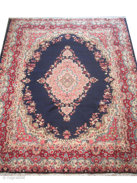 Meshed Persian, semi antique, 250 x 300 cm, ID: P-4420
The knots are hand spun wool, indigo background, the center medallion and the surrounding border with floral design, thick pile, in perfect condition.