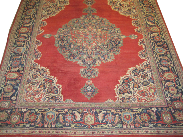 Sarouk Persian (American), knotted circa 1920 antique, 250 x 300 cm, ID: P-4594
The background color is tomato red, the surrounding border is geometrical design, part of the background has slightly short pile,  ...