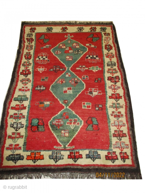 
Gabbeh Nomad knotted circa in 1928 semi antique, collectors item, 188 x 130 cm  carpet ID: T-711

The knots are hand spun wool, the black knots are oxidized, the warp and the  ...