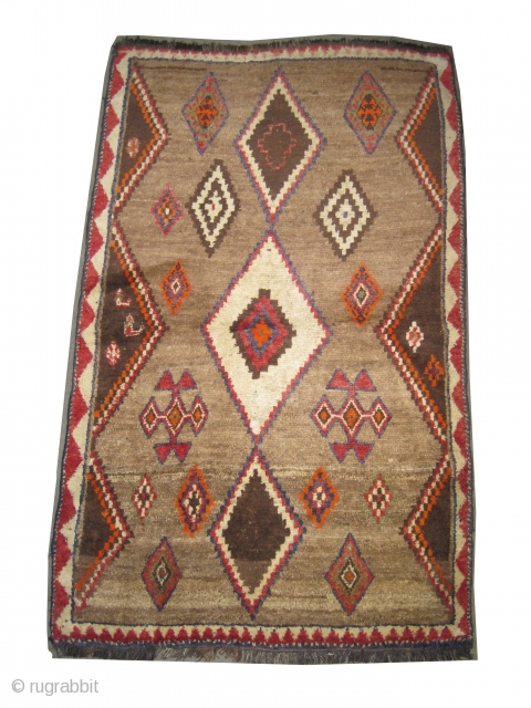  	

Gabbeh Louri Persian circa 1910 antique, collector's item, Size: 173 x 110 (cm) 5' 8" x 3' 7"  carpet ID: T-721
the knots are hand spun wool, the shirazi borders are  ...