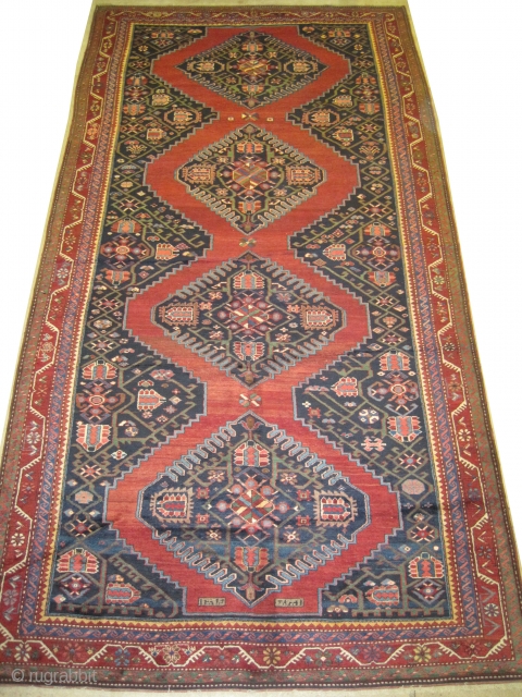 


Karabagh Caucasian dated 1320 = 1902 antique, collectors item.  383 x 195 (cm) 12' 7" x 6' 5"  carpet ID: W-113 
High pile, indigo background in perfect condition.



A similar example  ...