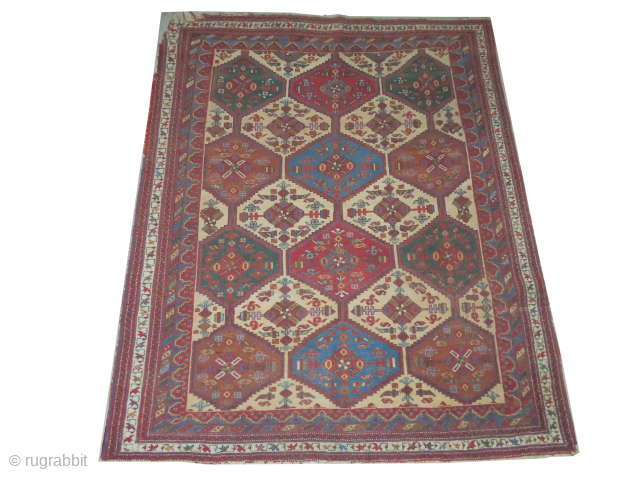Afshar Persian, knotted circa 1910 antique, 163 x 195 cm, ID: BRDI-39

The knots are hand spun wool, vegetable dyes, in good condition except the corner that needs repair.     