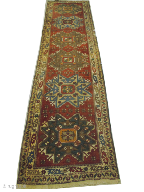 Kazak, old, 99 x 385 cm, ID: SSH-4
The knots, the warp and the weft threads are 100% wool, part of one border is damaged.         