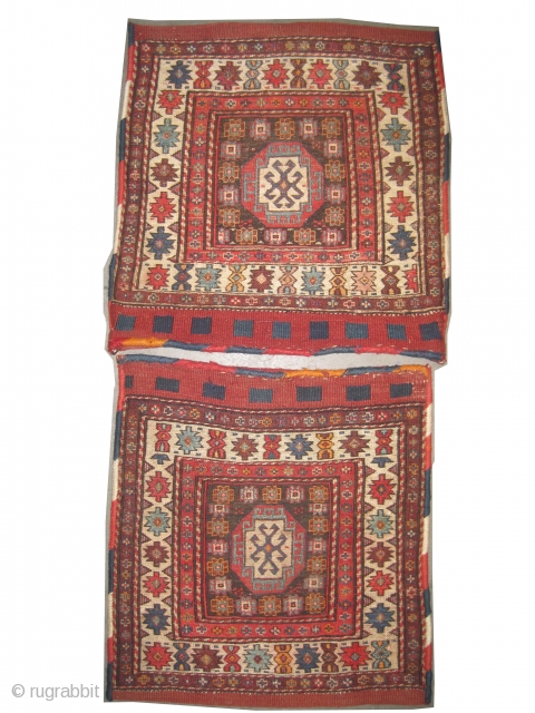 	

Khurjin Gendja Caucasian dated 1302 = 1884, antique, collector's item, it is a pair, the size of each is: 56 x 54 (cm) 1' 10" x 1' 9"  carpet ID: A-1204  ...