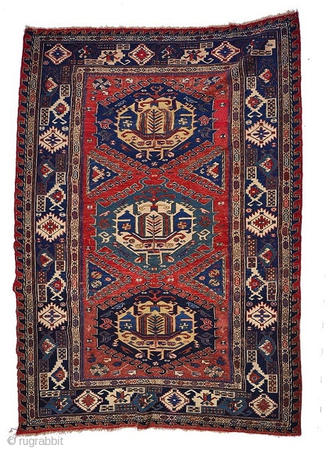 A CAUCASIAN SOUMAC KELIM, the red ground central panel with three hooked medallions within a deep blue ground border, 179 x 147cm

To be sold through auction on Wednesday 3rd June at Mallams  ...