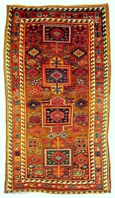An exemplary Sauj Bulagh rug, 19c. Lustrous wool and saturated natural colors, including aubergine. Excellent condition with typical oxidation of the background.           